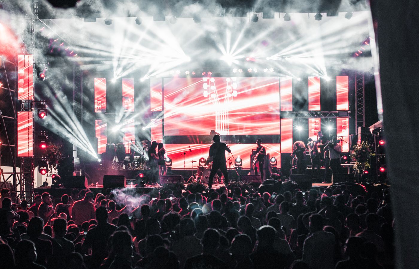 Live country music performance on a lit stage at the Georgia Mountain Fairgrounds in Hiawassee